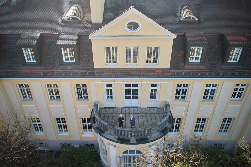 Balcony of the ifo institute's main building with Stephanie Dittmer and Clemens Fuest