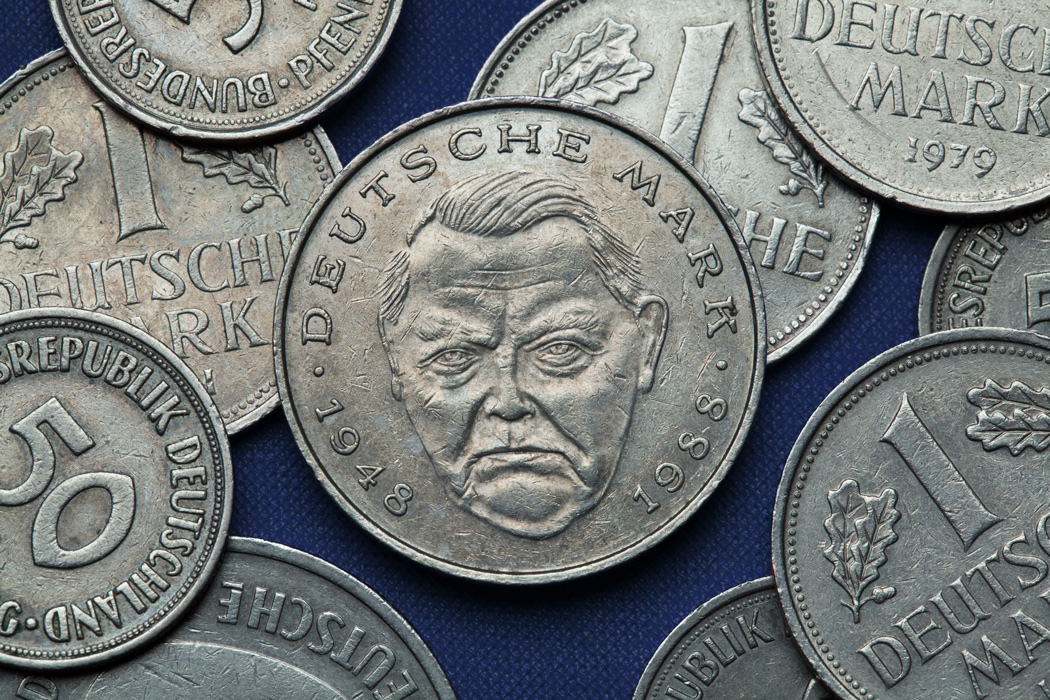 A Deutsche Mark coin featuring a portrait of Ludwig Erhard.