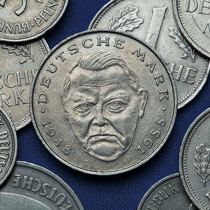 Ludwig Erhard on the back side of the 2 Deutsche Mark coin ©Vladimir Wrangel/Shutterstock.